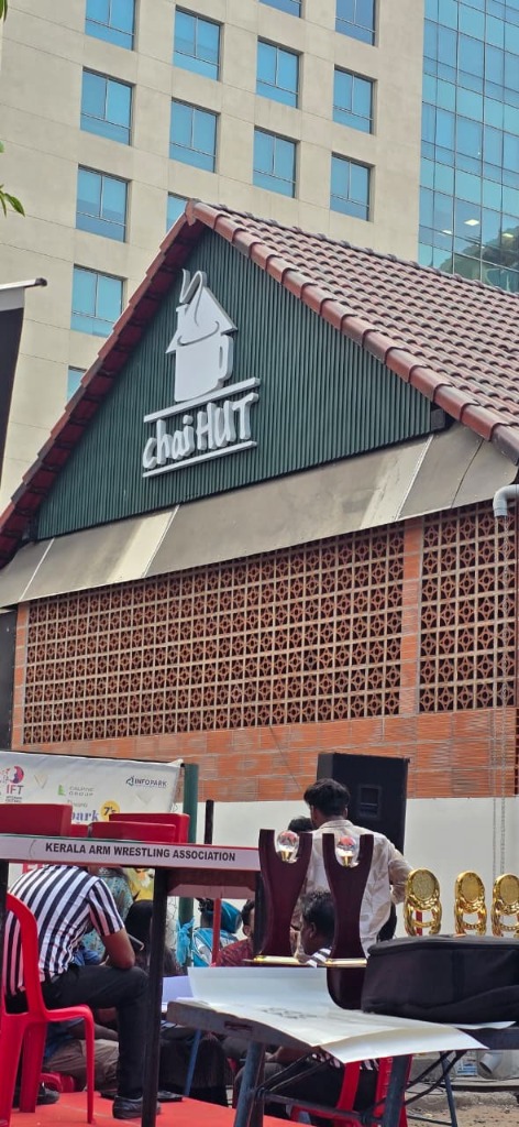 Chai Hut building exterior with the iconic green roof and the chai HUT signage at Infopark